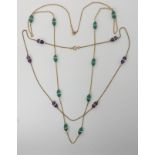 TWO VINTAGE NECKLACES A 9ct gold green and clear glass bead necklace length 70cm, together with a