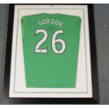 A GREEN CELTIC GOALKEEPER SHIRT No.26, the reverse lettered Gordon also autographed by Craig Gordon,