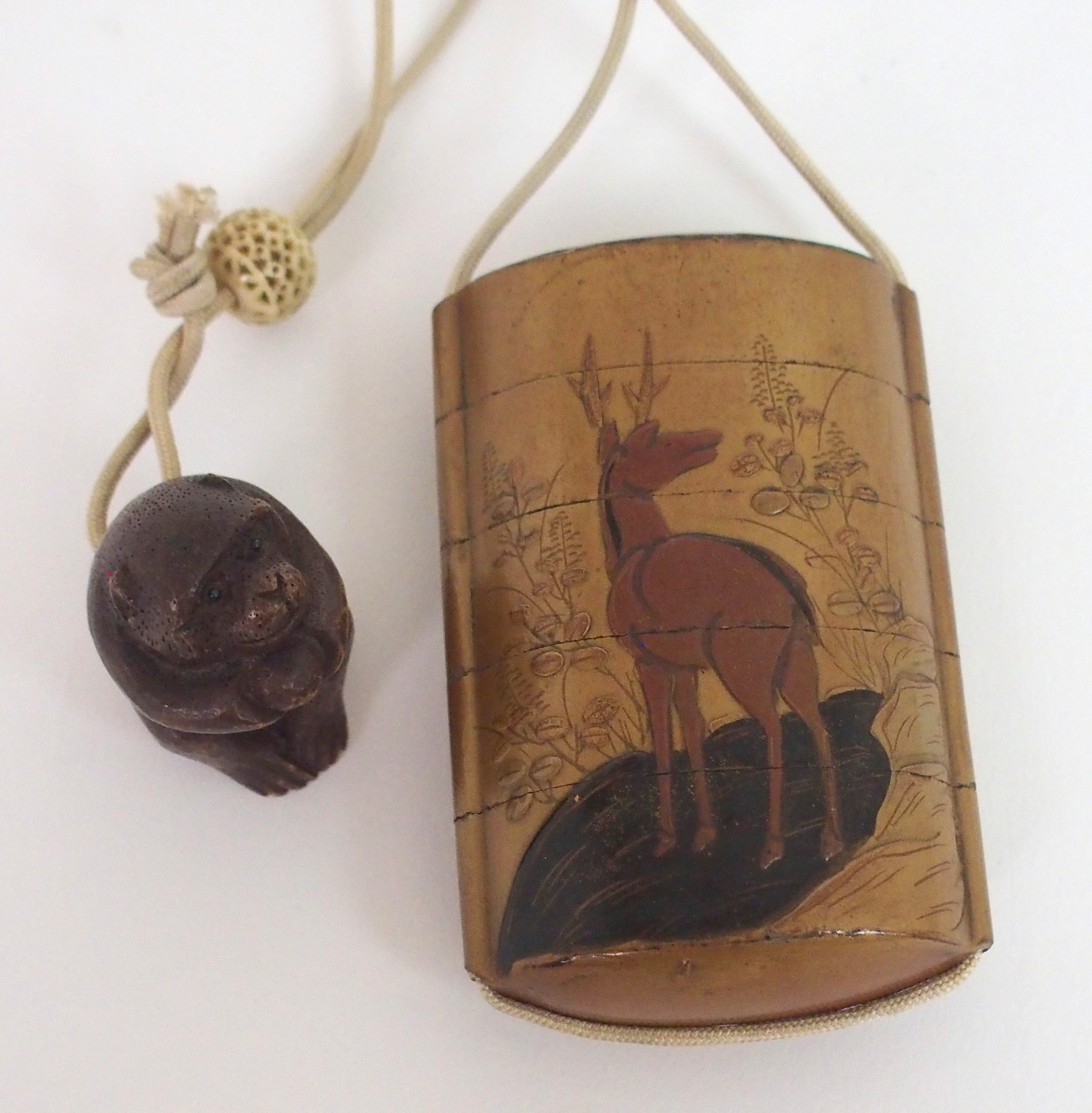 A JAPANESE FOUR-CASE INRO the gold laquered ground decorated with a deer, fitted with silk cord - Image 2 of 6