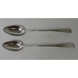 TWO SILVER BASTING SPOONS by Robert Gray, Edinburgh 1815 1816, the plain stems bearing a crest and