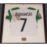 A GREEN AND WHITE CELTIC SHORT-SLEEVED SHIRT No.7, the reverse lettered Zurawski, with Champions