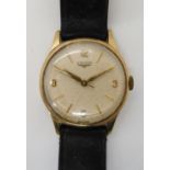 A 9CT GOLD GENTS LONGINES WATCH with cream dial gold coloured Arabic and baton numerals.