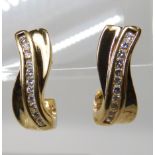 A PAIR OF 18CT GOLD AND DIAMOND EARRINGS length of drop 17mm, set with estimated approx 0.65cts of