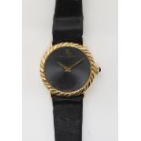 *WITHDRAWN* AN 18CT GOLD LADIES BAUME & MERCIER WATCH with rope patterned bezel, black dial and