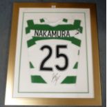 A GREEN AND WHITE CELTIC SHORT-SLEEVED SHIRT No.25, the reverse lettered Nakamura and autographed by