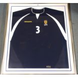 A BLUE SCOTLAND REPLICA INTERNATIONAL SHIRT the front bearing numerous player autographs, crica