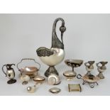 A COLLECTION OF MOTHER OF PEARL ITEMS including a silver footed dish, a white metal mounted bird
