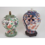 A CHINESE FAMILLE VERTE VASE LAMP painted with birds in branches, 31cm high and an Imari jar painted