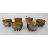 A MATCHED SET OF SIX SILVER SALTS four by George Angell & Co, London 1876 with two by Atkin