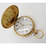 AN 18CT GOLD FULL HUNTER POCKET WATCH with white enamel dial with black Roman numeral, gold coloured