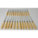 A TWENTY FOUR PIECE SILVER AND BONE HANDLED FISH CUTLERY SET (loose), by Martin Hall & Company,