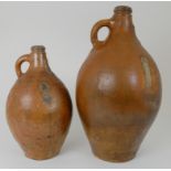 A LATE 18TH/EARLY 19TH CENTURY STONEWARE BELLARMINE JUG with mask and incised no 4, 47cm high,
