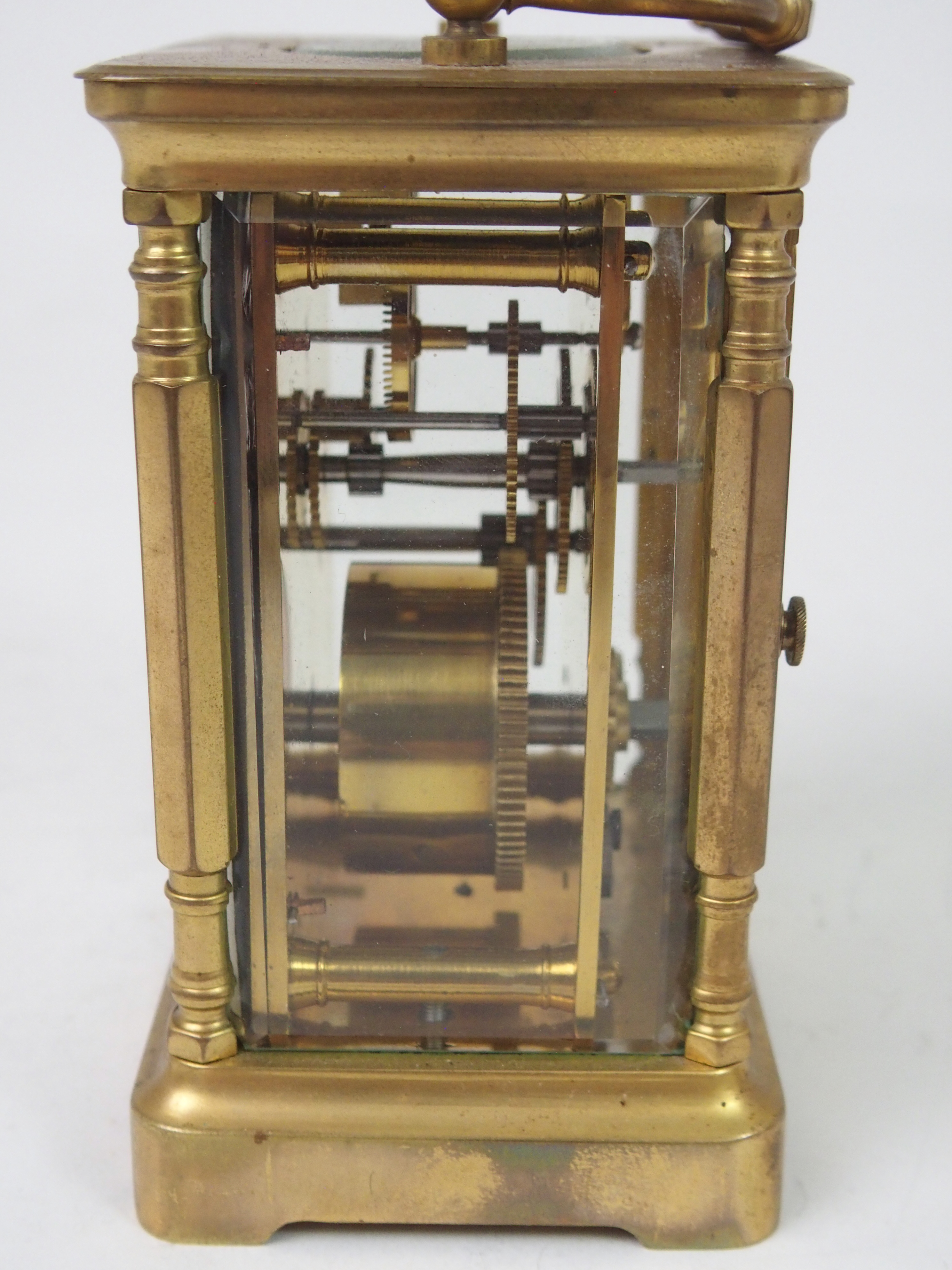 A FRENCH BRASS AND GLASS CARRIAGE CLOCK the white enamel dial with Roman Numerals, retailed by W. - Image 3 of 8