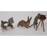 A COLD-PAINTED BRONZE FIGURE OF A HARE indistinctly stamped, 6cm wide and cold-painted figure of a