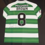 A GREEN AND WHITE CELTIC SHIRT No.8, the reverse lettered Brown, also autographed by Scott Brown, 89