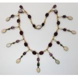 *WITHDRAWN* A YELLOW METAL GEM SET MEDIEVAL STYLE FRINGE NECKLACE set with foiled back amethysts