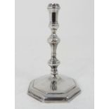 A GEORGE II SILVER TAPER STICK by William Gould, London 1750, the knopped stem with faceted