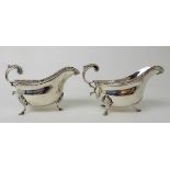 A PAIR OF SILVER SAUCEBOATS by S W Smith & Company, Birmingham 1922, with gadrooned border, open