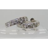 A PAIR OF 9CT WHITE GOLD DIAMOND HOOP EARRINGS set with estimated approx 2.88cts