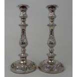 A PAIR OF SILVER CANDLESTICKS maker's mark BLD Birmingham 1948, the removable drip pans on
