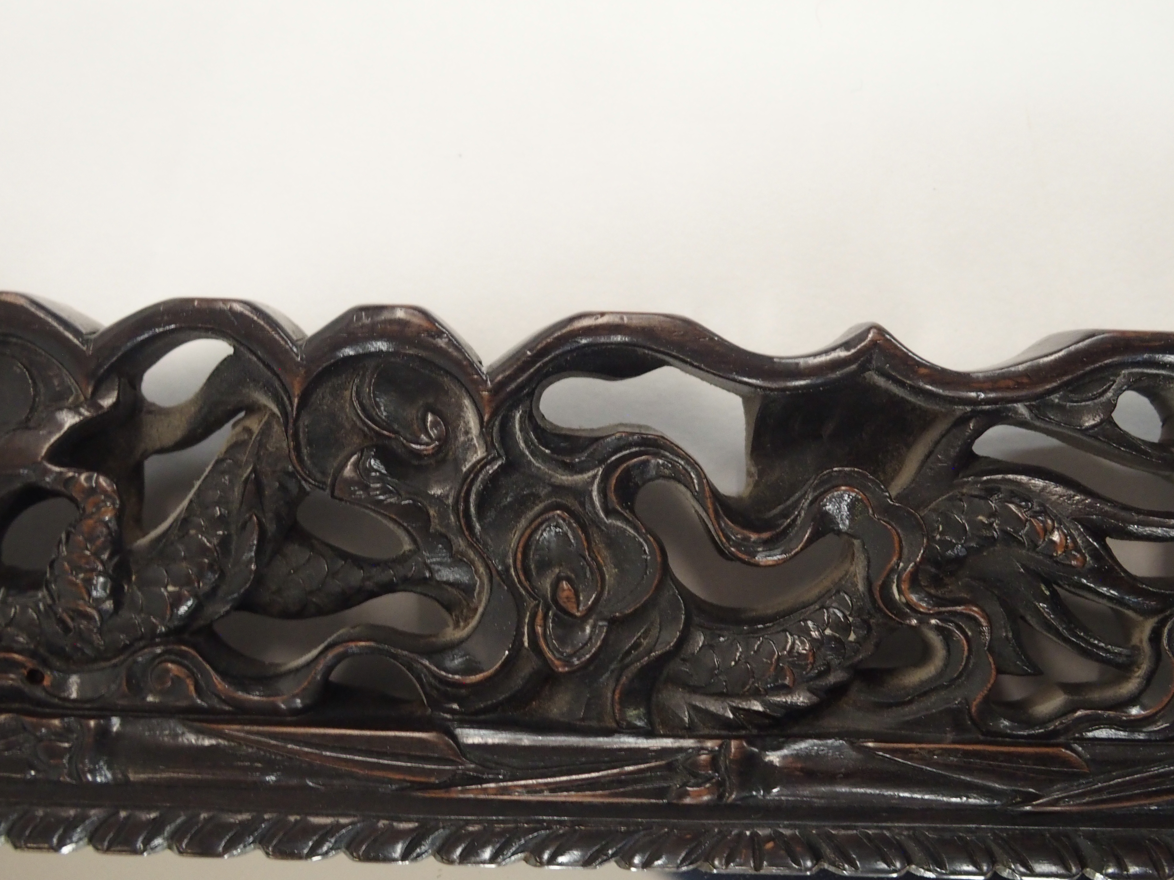 A CHINESE HARDWOOD WALL MIRROR the pierced frame carved with dragons chasing the flaming pearl of - Image 6 of 7