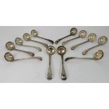 A SET OF TWELVE SILVER SAUCE LADLES by Chawmer & Co., (George William Adams), London 1867, the