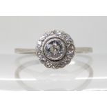 A VINTAGE PLATINUM DIAMOND ENGAGEMENT RING set with an old cut diamond of estimated approx 0.30cts