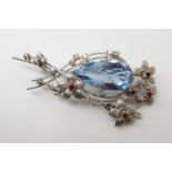AN 18CT WHITE GOLD AQUAMARINE, DIAMOND AND RUBY BROOCH by Cropp & Farr Ltd, the dimensions of the