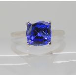 A PLATINUM AND TANZANITE RING