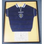 A BLUE SCOTLAND REPLICA INTERNATIONAL SHIRT the front bearing numerous player autographs from the