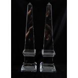 A PAIR OF CUT CRYSTAL OBELISKS 58cm high Condition Report: Some large chips to corners of bottom