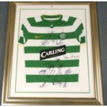 A GREEN AND WHITE CELTIC REPLICA SHORT-SLEEVED SHIRT the front bearing numerous player autographs