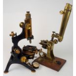 A VICTORIAN BRASS MICROSCOPE stamped James How & Co, 5 Bride St, Late, 2 Foster Lane, City,