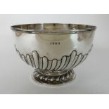 AN EDWARDIAN SILVER PUNCH BOWL by R & W Sorley, Glasgow 1905, of circular form with spiral fluted