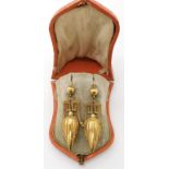 A PAIR OF VICTORIAN YELLOW METAL DROP EARRINGS with wire and granulation detail to the pod shaped
