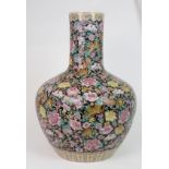 A LARGE CANTON MILLIEFIORI PATTERN BALUSTER VASE painted with allover floral design, within yellow