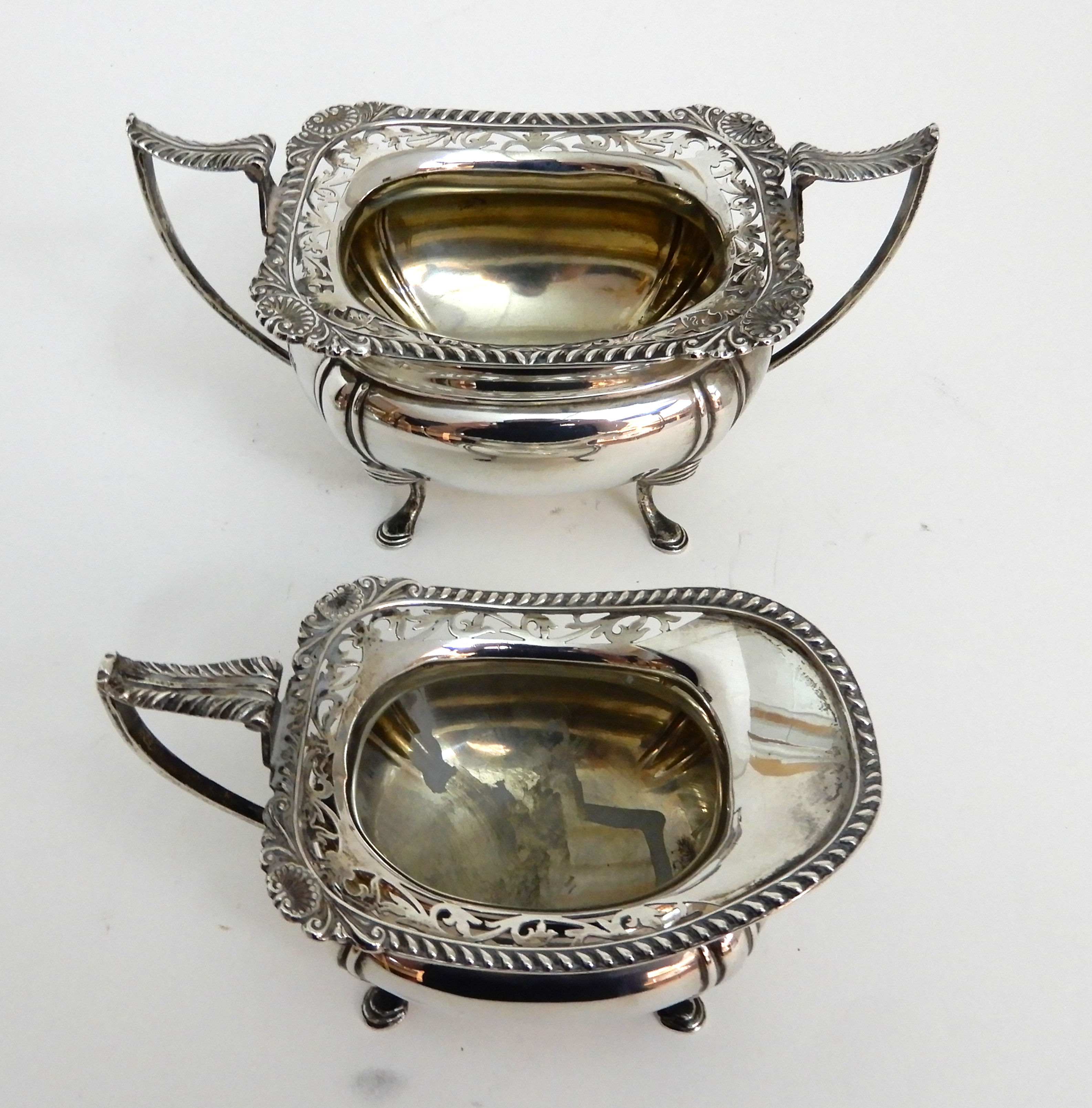 A THREE PIECE SILVER TEA SERVICE by James Deakin & Son, Sheffield 1919, of rounded rectangular - Image 5 of 10