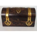 A VICTORIAN COROMANDEL DOME TWO DIVISION TEA CADDY with brass strap work decoration, the interior