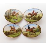 A PAIR OF 9CT GOLD HUNTING SCENE CUFFLINKS each face with a different hand painted scene of horse