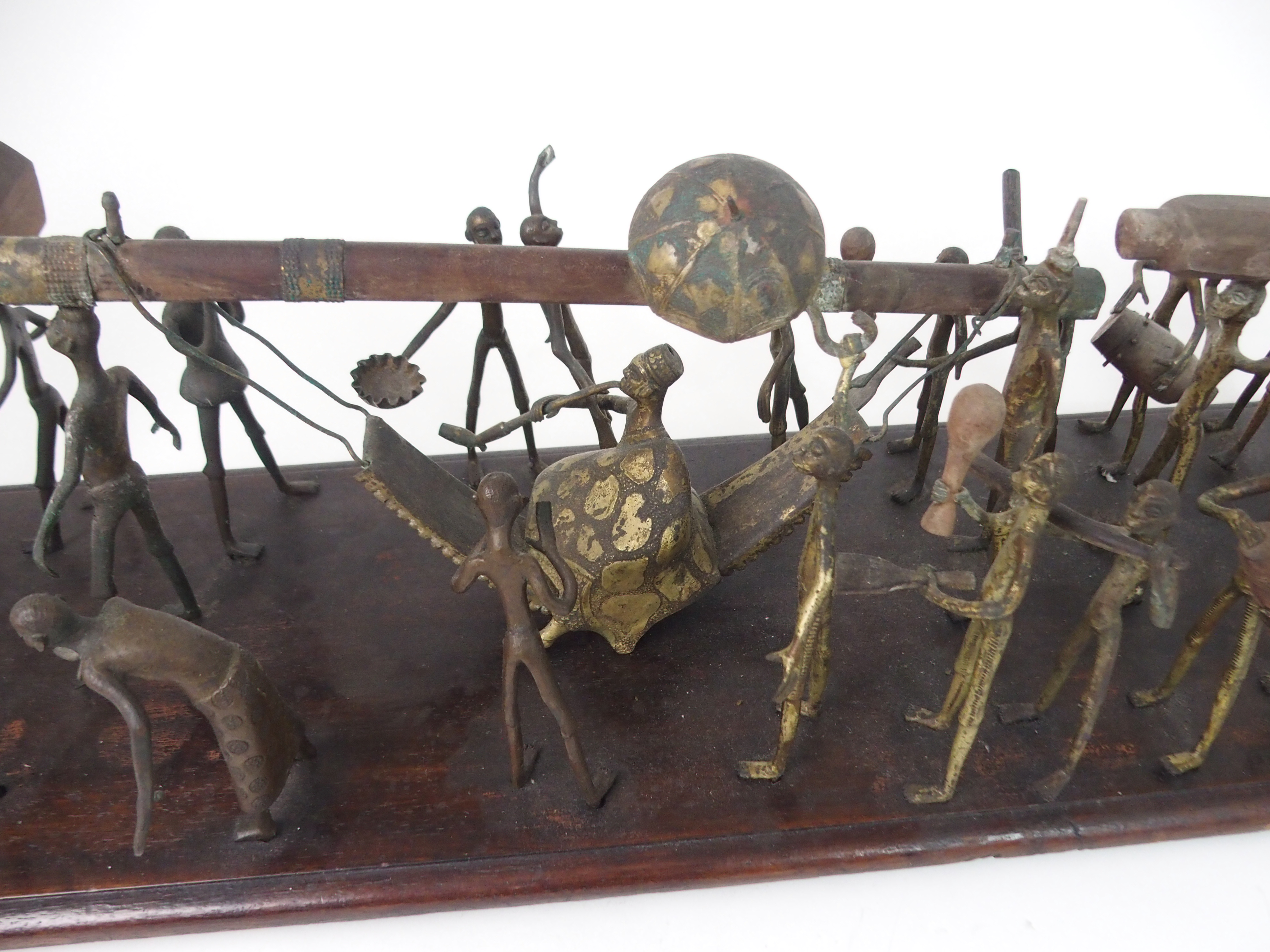 A DAHOMEY PROCESSIONAL GROUP, BENIN in brass and wood, with twenty nine figures, mounted on a - Image 2 of 8