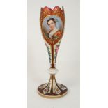 A BOHEMIAN CAMEO GLASS VASE of tulip form with painted roundel of a maiden, flanked by other