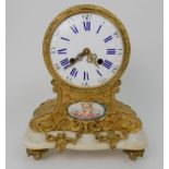 A FRENCH STYLE MANTLE CLOCK the drum head enamel dial with roman numerals, marked for G Mylne,