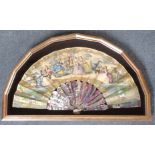 AN EARLY PICTORIAL HAND FAN with mother of pearl handle, framed and glazed, 35 x 57cm Condition