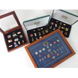 TWO CASED SET OF THE OLYMPIC PROGRAMME ATLANTA 1996 ENAMEL LAPEL BADGES a framed set of Sydney