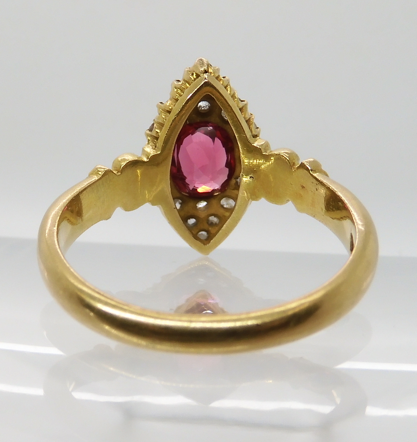 A YELLOW METAL ROSE CUT DIAMOND AND PINK GEM SET RING stamped 18 to the scroll shouldered - Image 4 of 5