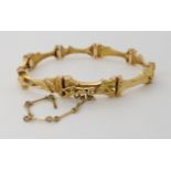 A 14K GOLD LAPPONIA BRACELET of abstract form, length 18cm, weight 17.8gms Condition Report: