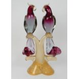 A LARGE MURANO GLASS PARROT GROUP the purple glass birds with sommerso golden aventurine stand and