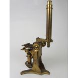 A VICTORIAN BRASS MICROSCOPE BY A. ROSS, LONDON the foot stamped A Ross, London, No.467, with
