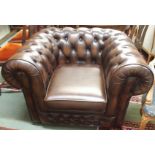 A dark tan Thomas Lloyd Chesterfield club chair Condition Report: Available upon request