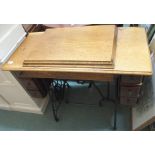 A singer sewing machine table Condition Report: Available upon request